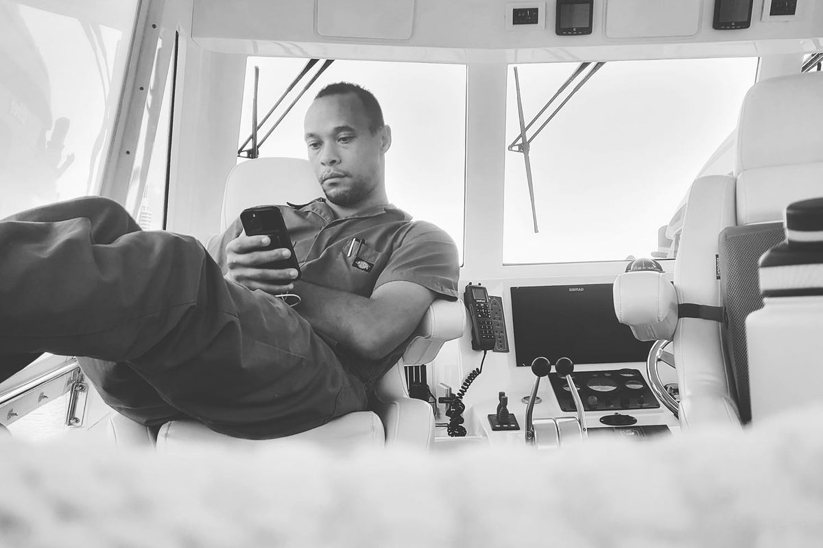 Charlie — Founder, Call Charlie Holdings LLC — at the helm, Fort Lauderdale FL